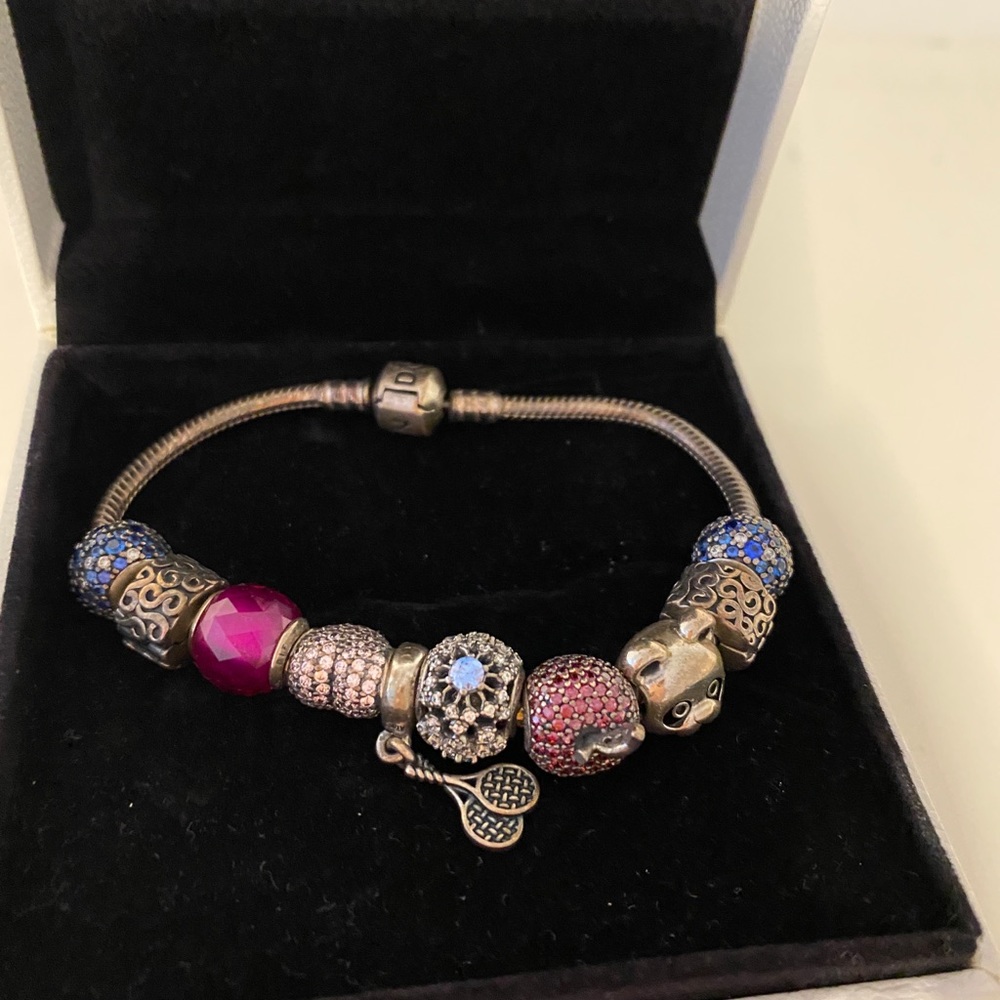 Pandora bracelet with box and charms